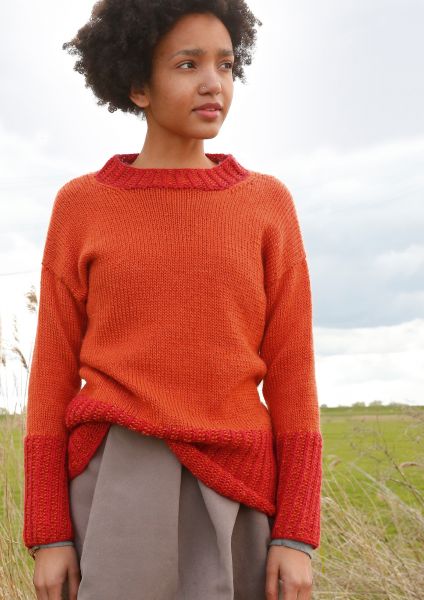 Orange-roter Pullover